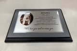 Memorial plaque with photo of dog and quote