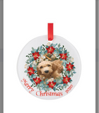 Round acrylic ornament with red ribbon and dog design